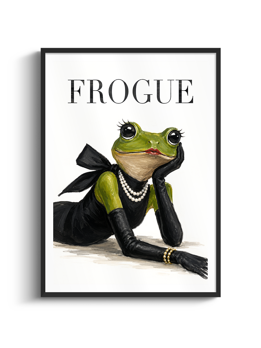 A framed art print featuring a whimsical illustration of a green frog dressed in a black dress, black gloves, and pearl necklaces, with the word 'FROGUE' printed at the top. The print is displayed against a clean white background with a subtle drop shadow.